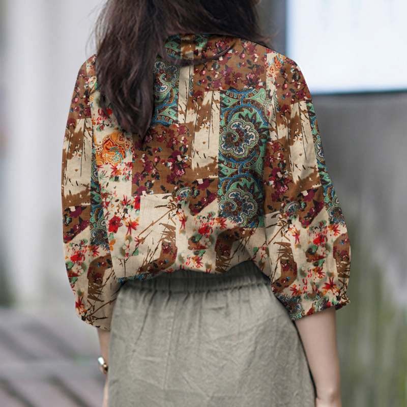 Womens Stylish V-neck Top With Three-quarter-length Sleeves Featuring A Printed Design