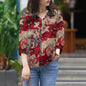 Womens Stylish V-neck Top With Three-quarter-length Sleeves Featuring A Printed Design